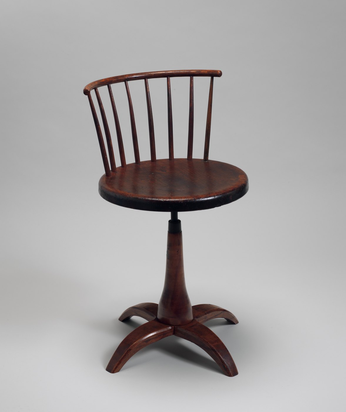 Revolving shop chair in oak and maple